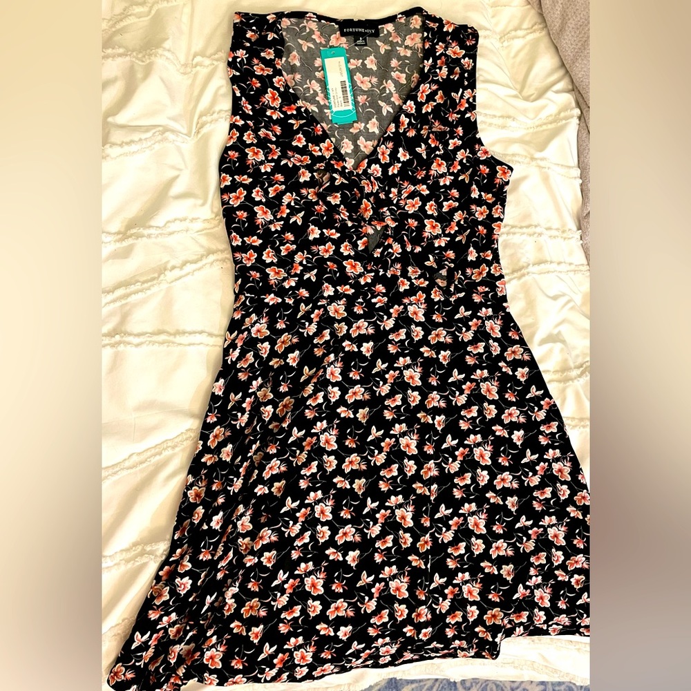 Knit dress , NEVER been worn, new with tags, size small .